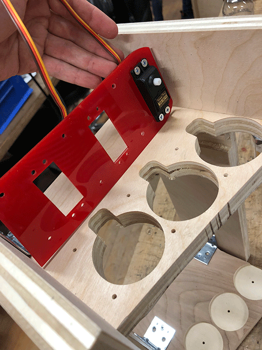 The acrylic mount for the servos perfectly aligned with the cnc routed frame